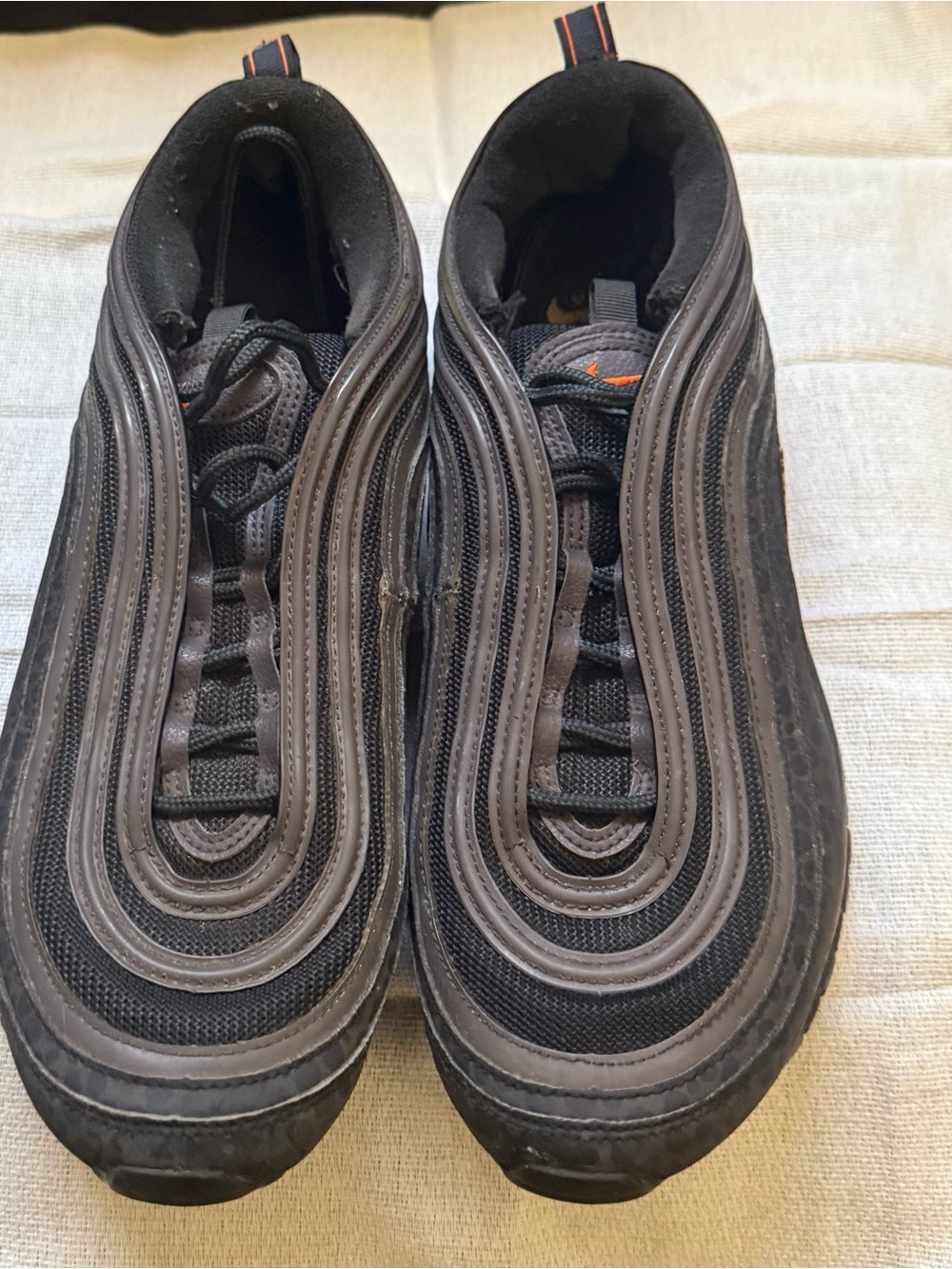 Nike Men's Black Athletic Sneakers with Subtle Orange Detail